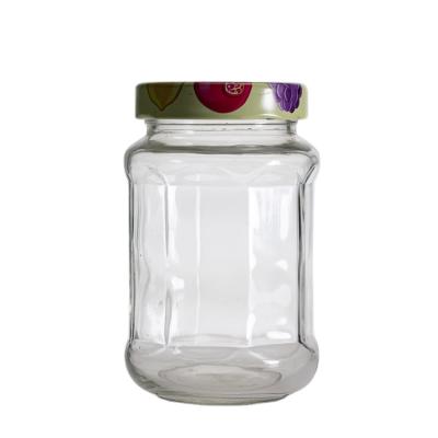 China Modern Wholesale Clear Food Grade Glass Jars Hexagon Food Packaging Jar Storage Glass Jar for sale