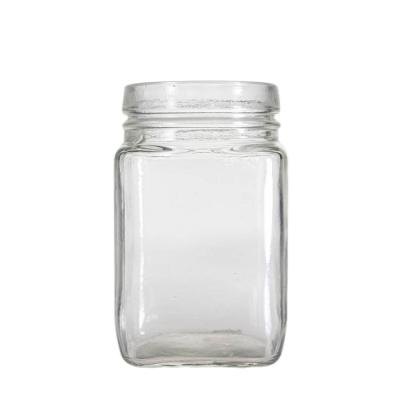 China Wholesale Modern Food Grade Glass Jars Honey Glass Food Jar Glass Food Packaging For Home Decor for sale