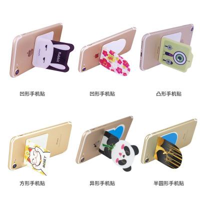 China Hot Sale Adjustable Factory Directly Supply Mobile Phone Smart Lazy Holder Sticky Sticker Car Bracket Holder for sale