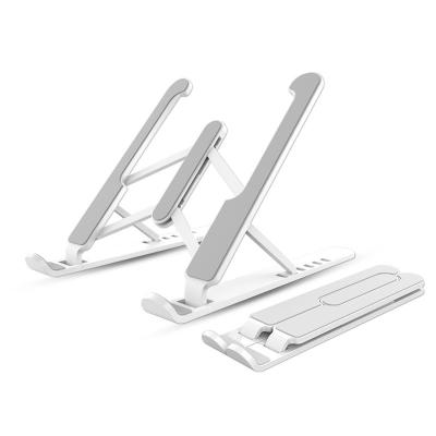 China Portable Folding Portable Folding Laptop Notebook Stand Small Adjustable PC Table ABS Computer Table Top Aluminum Adjustable Stand for sale