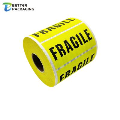 China Strong Adhesive Self Adhesive Roll Packaging Label 4x6 Shipping Mark Caution Yellow Fragile Sticker With Black Printed For Shipping Boxes for sale