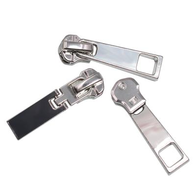 China Other Wholesale New Design Custom Embossed Zipper Pullers For Garment Metal Zipper Pull for sale