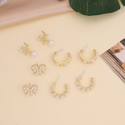 China FASHIONABLE Pearl Butterfly Angel Stud Earrings For Women Boho Earrings for sale