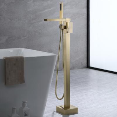 China Without Slide Bar Grifo Bathroom Black And Gold Copper Floor Stand Waterfall Tub Faucet With Shower for sale