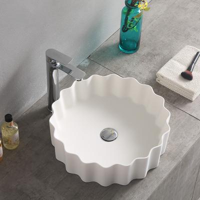 China Modern White Italian Irregular Small Size Vaniti Basins Bathroom Sink Solid Surface Stone Wastafel Color Stone Wash Basin for sale