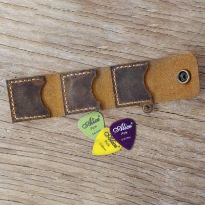 China Protection Personalized Distressed Leather Guitar Pick Rack Case Gifts Guitar Player Pick Bag Holder Pouch for sale