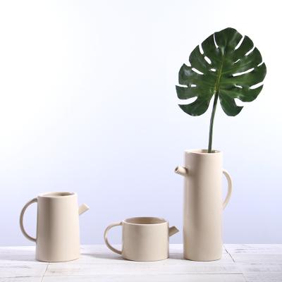 China Nordic Simple Modern Over-glazed Kettle Vase Ornaments Study Creative Decoration Living Room Ceramic Flower Vase for sale