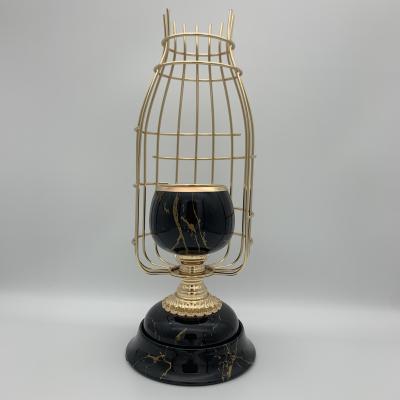 China 2020 New Design Customized ECO-frendly Water Transfer Cage Black Metal Small Metal Floor Candle Holder Wedding Party Decoration for sale