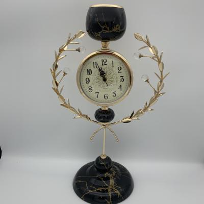 China ECO-frendly 2020 New Design Customized Metal Water Transfer Clock Small Floor Candle Holder Wedding Party Decoration for sale