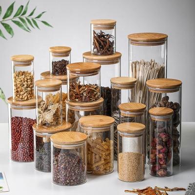 China ODM/OEM Home and Kitchen Food Storage Containers Heatable Glass Storage Spice Jar with Airtight Borosilicale Bamboo Clear Lid Glass Jar for sale