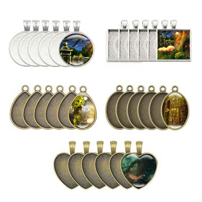 China CLASSIC White Round Bezel Metal Picture Frame Shape Drop Water Pendant Trays For DIY Cabochon Jewelry Making for sale