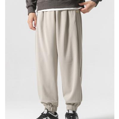 China Anti-wrinkle New Oversize Fashion Blank Brand Casual Trousers Sweatpants For Men Baggy Custom Puff Print Sweatpants for sale