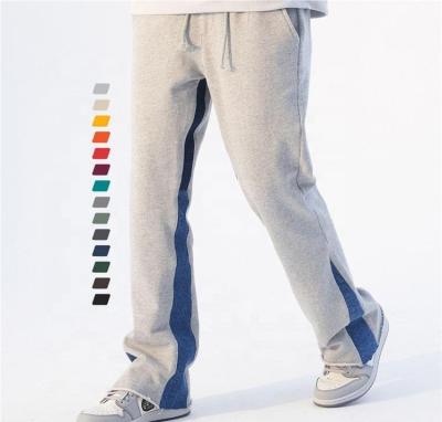 China Anti-wrinkle Hip Hop Custom Baggy Sweatpants Jogger Pants Flare Streetwear Pants Blank Color blocked Over sized Flared Sweatpants for sale