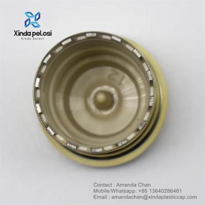 China Capuchón de tornillo UV en forma de hongo de plástico dorado para botella de perfume botella cosmética en venta