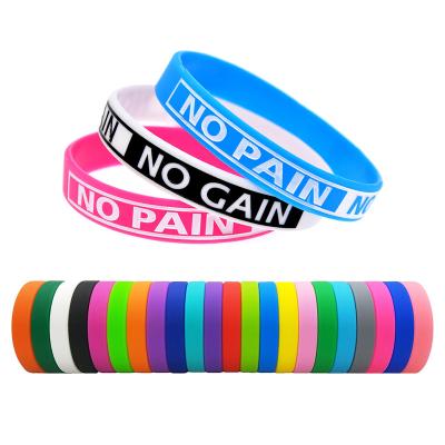 China Waterproof Debossed Customize Shape Wristbands Promotional Events And Brand Awareness Print Silicone Wristband Rubber Wristband YJEL0022 for sale