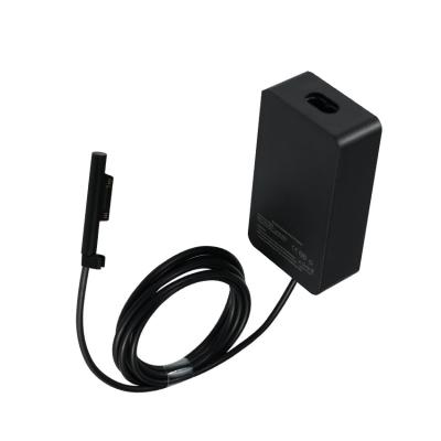 China Adaptador de energía para tabletas de 15V 4A 65W para cargador de computadoras portátiles de Micr Osoft Surface Pro en venta