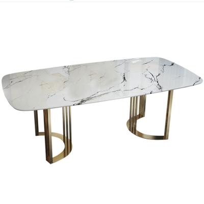 China Custom luxury and minimalist hot wholesale steel gold excellent quality light luxury dining table for sale