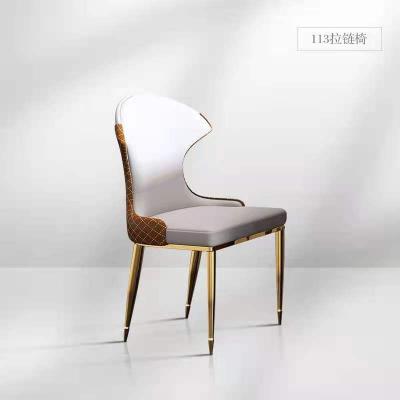 China 2021 Minimalist White Light Wooden Dining Chair Modern Luxury High Back Leather Dining Chairs for sale