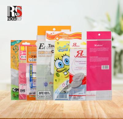 China Customize OPP Header Bag Plastic Poly Bag Small Gift OPP Header Bag With Hanging Hole for sale