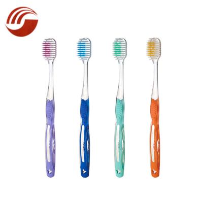 China Daily Use Colorful Family Use Transparent Widen Handle Toothbrush for sale