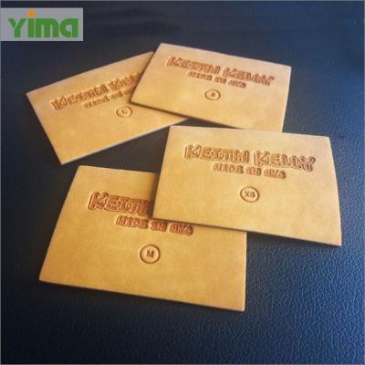 China Hot Viable Custom Leather Label Suppliers Genuine China Design PU Label Logo Leather Label Patch Embossed For Garment for sale