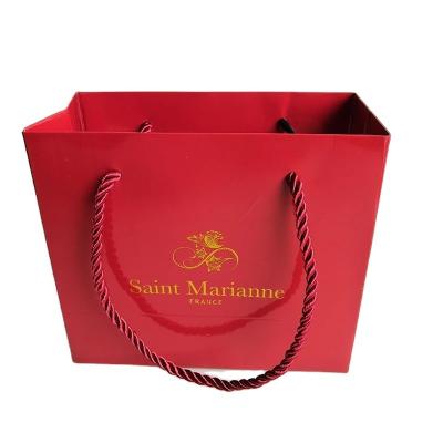 China Recycled luxury candy bag food bag gift bag wedding pink packaging materials custom paper logo shopping for sale