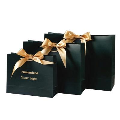 China Recyclable Custom Logo Ribbon Paper Bags For Shopping for sale