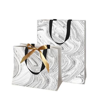 China Wholesale Recyclable Materials Factory Paper Wedding Favor Handbag Recycle Materials Shopping Custom Paper Bags White Marble Gift Bag for sale