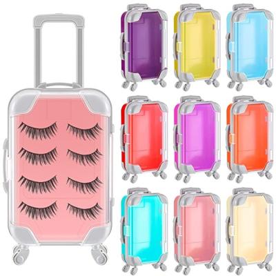 China 2023 Plastic New Mini Rolling Suitcase Favor Box Miniature Trolley Empty Tiny Suitcase Boxes Wick Candy Box For Travel Theme Parties for sale