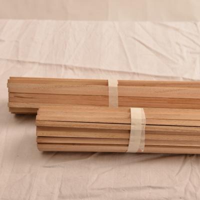 China Traditional factory direct wooden Paulownia 2x4 sticks stripe holz zum verkauf boxes models 12mm preis Paulownia wood for sale