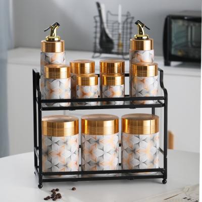 China Eco-friendly Elegant Design Porcelain Oil Vinegar Bottle Salt Pepper Sugar Salt Pepper Storage Cylindrical Storage Jar Kitchen Spice Jars Sets for sale