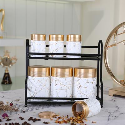 China Amber Good Eco-Friendly Selling Ware White Marble Jar With Lined Canister Porcelain Condiment Set Set With Metal Stand for sale