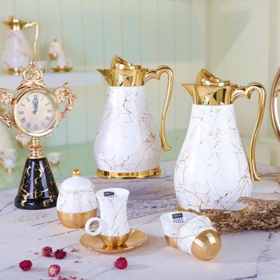 China Viable Arabic style porcelain dallah pot cawa cawa royal white gold cup set jug glass gift coffee vacuum coating Arabic tea set for sale