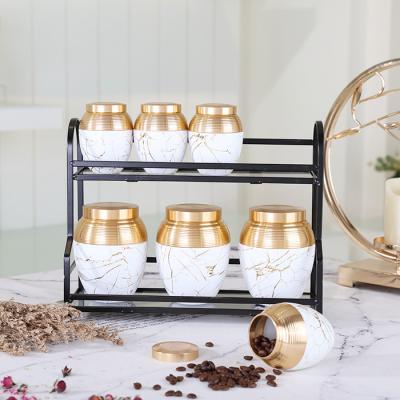 China Unique Design Eco-friendly White Marble Kitchen Used 7pcs Porcelain Jar Tea Sugar Coffee Canister Canister Sets For Kitchen Storage for sale