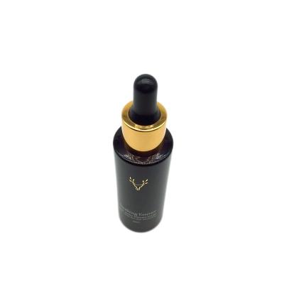 China Luxury 30ml Cosmetic Black Logo Essential Oil Serum Glass Bottle With Dropper for sale