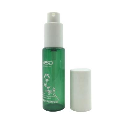 China Cosmetic Wholesale Custom Sizes 20ml Green Color Coated Glass Lotion Serum Pump Bottles for sale