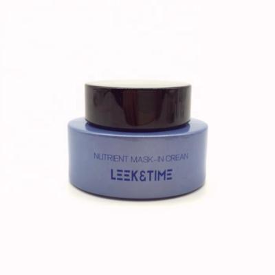 China Luxury Oval Shape Skin Care Container 50g Blue Glass Cosmetic Face Cream Packaging Jar With Black Metal Cap for sale