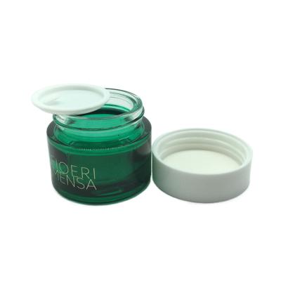 China Cosmetics Wholesale UV Production Green Frosted Glass Jars 15g 30g 50g Cream Jar Cosmetics for sale