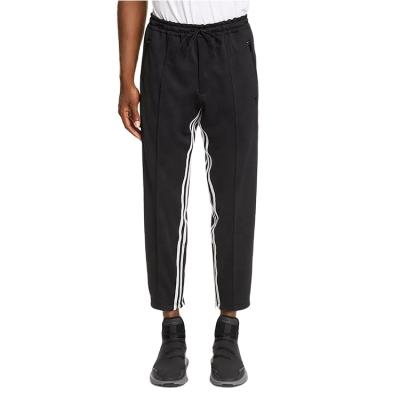 China OEM Anti-Static Mens Wholesale Colorblock Track Pants With Slim Fit Bottom Zipper Striped Trackpants for sale