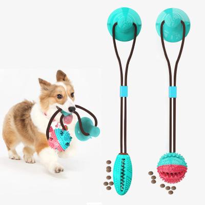 China Multi-Functional Bite Ball Sucker Stocked Leaking Pet Driver Dog Chew Toy With Suction Cup for sale