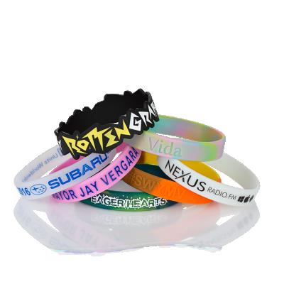 China Debossed +Imprinted Give Away Logo Debossed Silicone Event Wristband &Party for sale