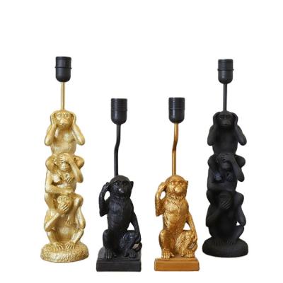 China Eclectic Nordic Polyresin Home Decoration Gold Monkey Light For Restaurant Hotel Garden for sale