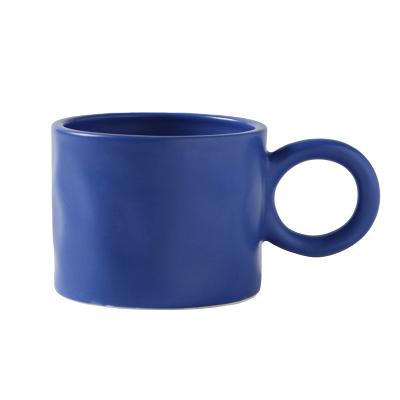 China New Design Klein Blue Ink Milk Splatter Ears Cup Viable Large Ceramic Couples Coffee Mug With Circle Handle for sale