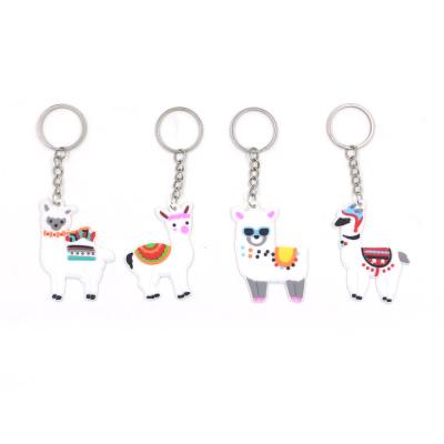 China Tsushima keygen car keychain creative mobile phone key chain pendant OEM custom PVC soft plastic metal key ghost for sale