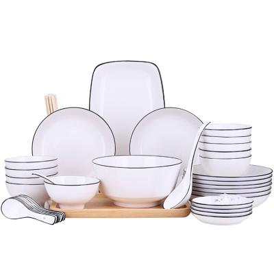 China Sustainable High End White Ceramic Porcelain Dinner Set Dinnerware Dish Bowl Sets With Black Rim for sale