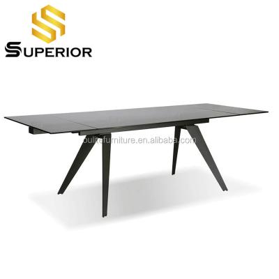 China Extendable Luxury Modern Black Glass Top Function Telescopic Dining Table for sale