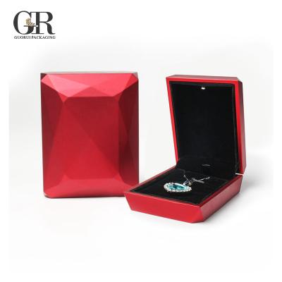 China Romantic Plastic+Velvet Inset Guorui Necklace Bracelet Light Plastic Jewelry Box Luxury Ring Led Light Jewelry Box for sale