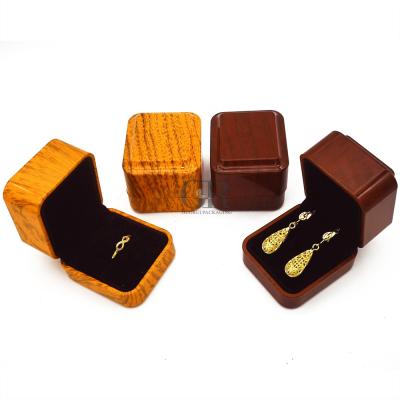 China Plastic+Velvet Inset Shiny Lacquer LED Light Jewelry Boxes Necklace Wooden Bracelet Ring Earring Cheap Wooden Jewelry Boxes With Light for sale