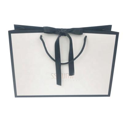 China 210gsm Recyclable Free Custom LOGO Beautiful Matt Finish Recycling Eco-Friendly Jewelry Gift Packaging Bags With Ribbon for sale