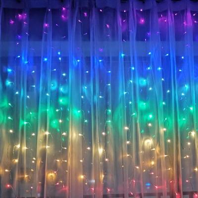 China CURTAIN LIGHT rainbow window wall led string curtain lights with remote icicle fairy lights for living room Christmas party for sale